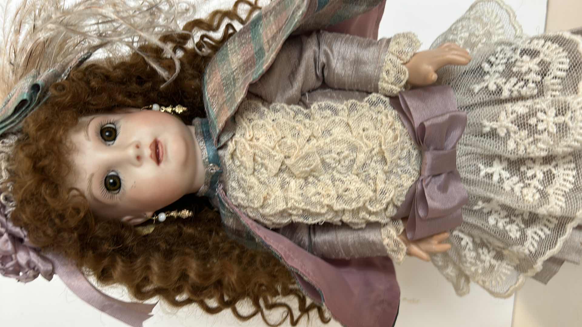 Photo 6 of GLOBAL DOLL (HAIR IS 100% MOHAIR) PORCELAIN DOLL ON STAND MOVABLE PARTS