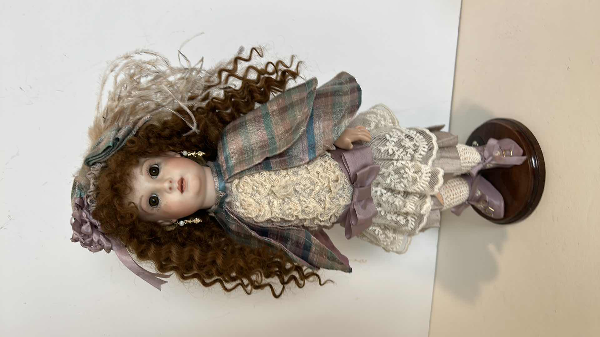 Photo 2 of GLOBAL DOLL (HAIR IS 100% MOHAIR) PORCELAIN DOLL ON STAND MOVABLE PARTS