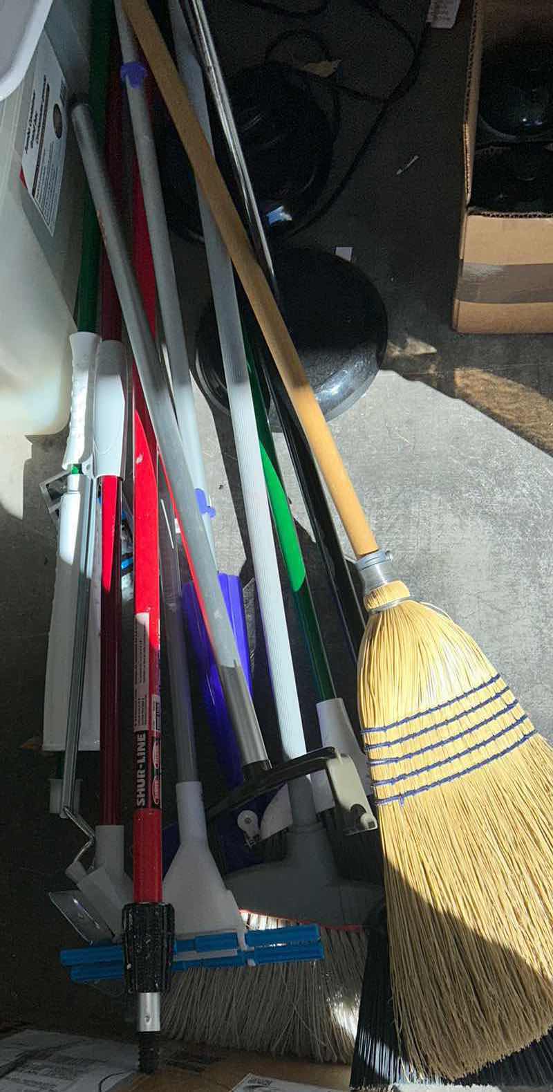 Photo 1 of BROOMS AND MOPS