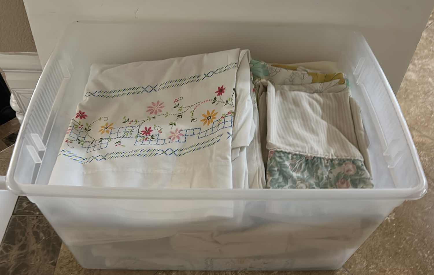 Photo 1 of TOTE FULL OF LINENS