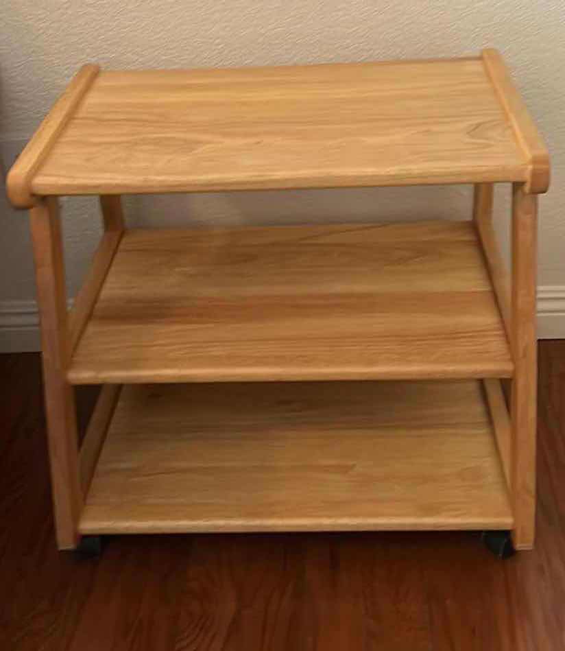 Photo 1 of SMALL WOOD TABLE WITH SHELVES ON WHEELS 23 1/2” x 18 1/2” x 22 1/2”