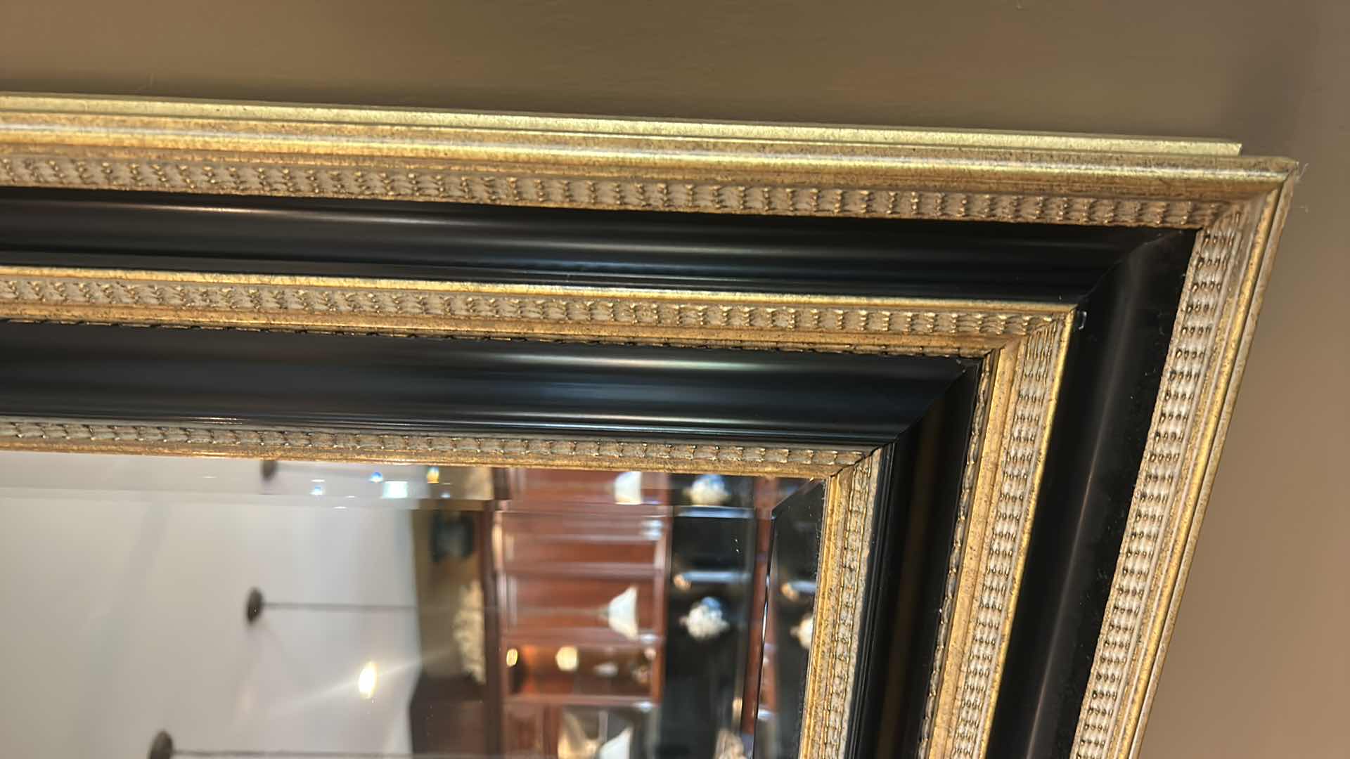 Photo 2 of VERY LARGE ORNATELY FRAMED IN GOLD AND BLACK BEVELED GLASS MIRROR 
57 inches five 44 1/2 inches
