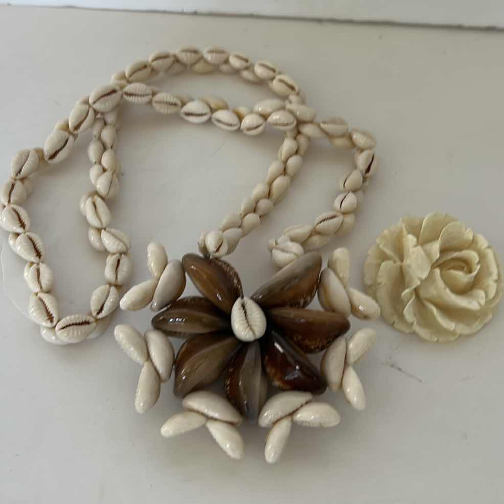 Photo 1 of JEWELRY- SHELL NECKLACE AND CARVED PIN