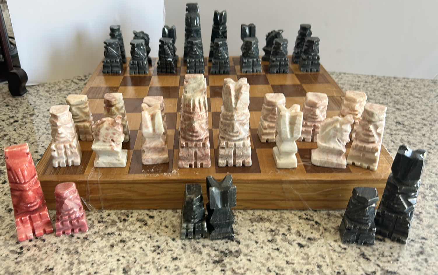 Photo 1 of VINTAGE CHESS SET- HEAVY CARVED STONE PIECES
