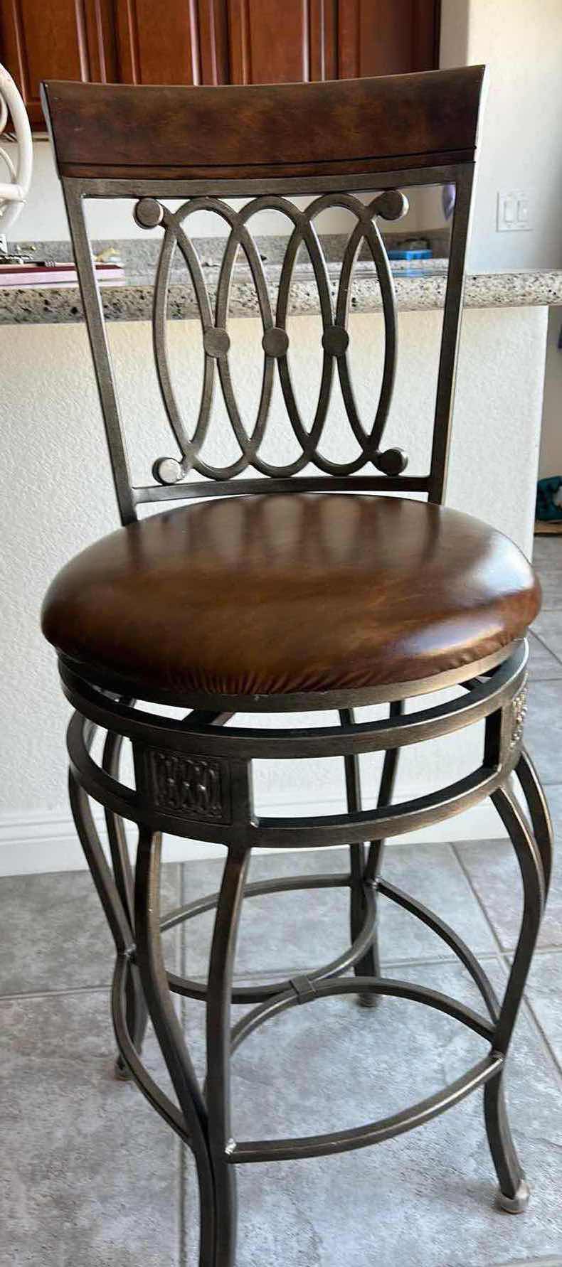 Photo 1 of HEAVY METAL SWIVEL BARSTOOL H44”