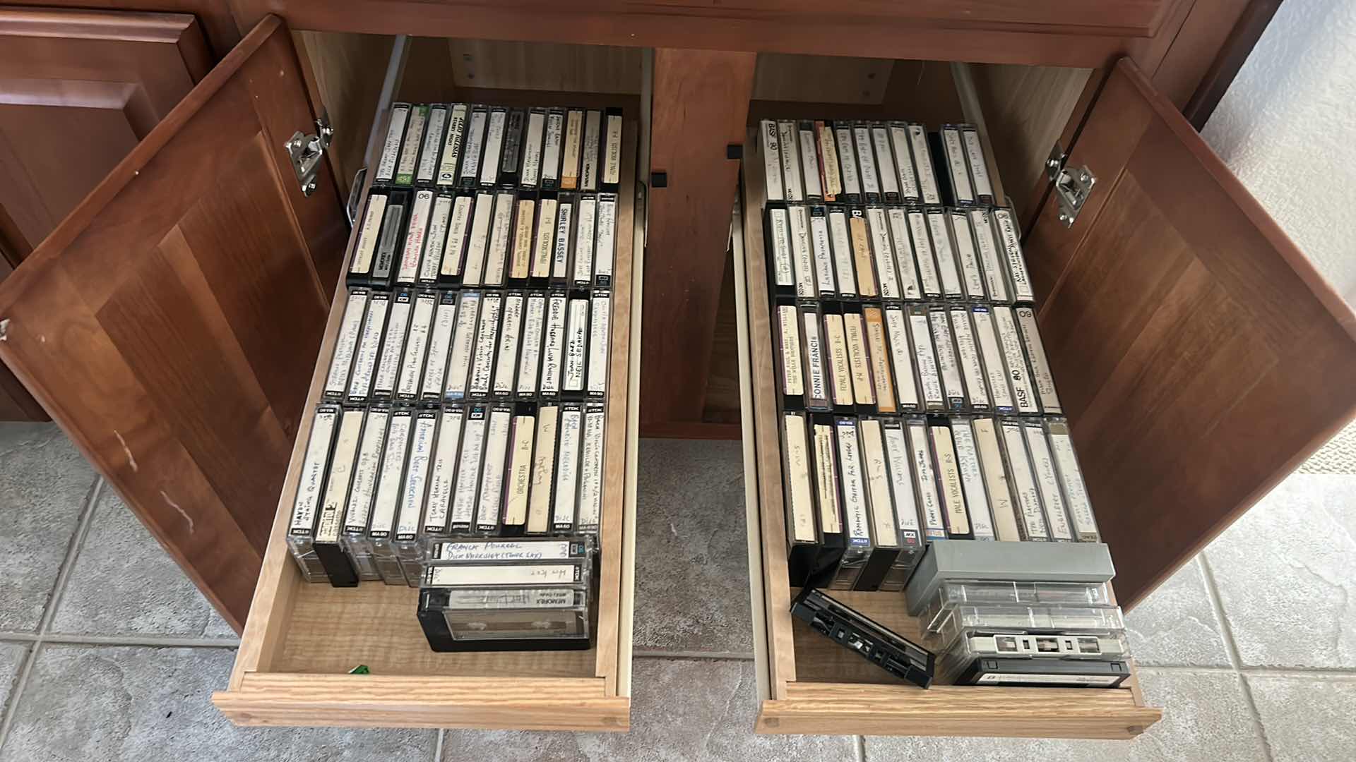 Photo 1 of 2 ROWS OF CASSETTE TAPES