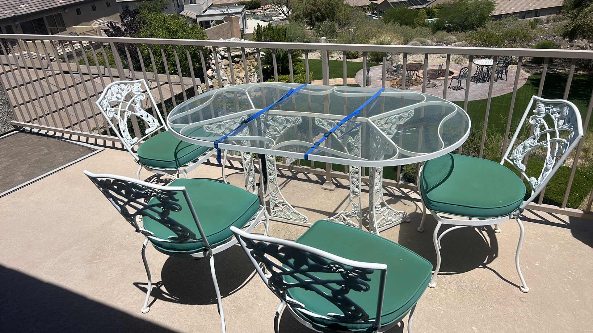 Photo 1 of HEAVY PAINTED METAL VINTAGE PATIO TABLE WITH 4 CHAIRS 
5‘ x 34 1/2“ high 28 1/2 inches