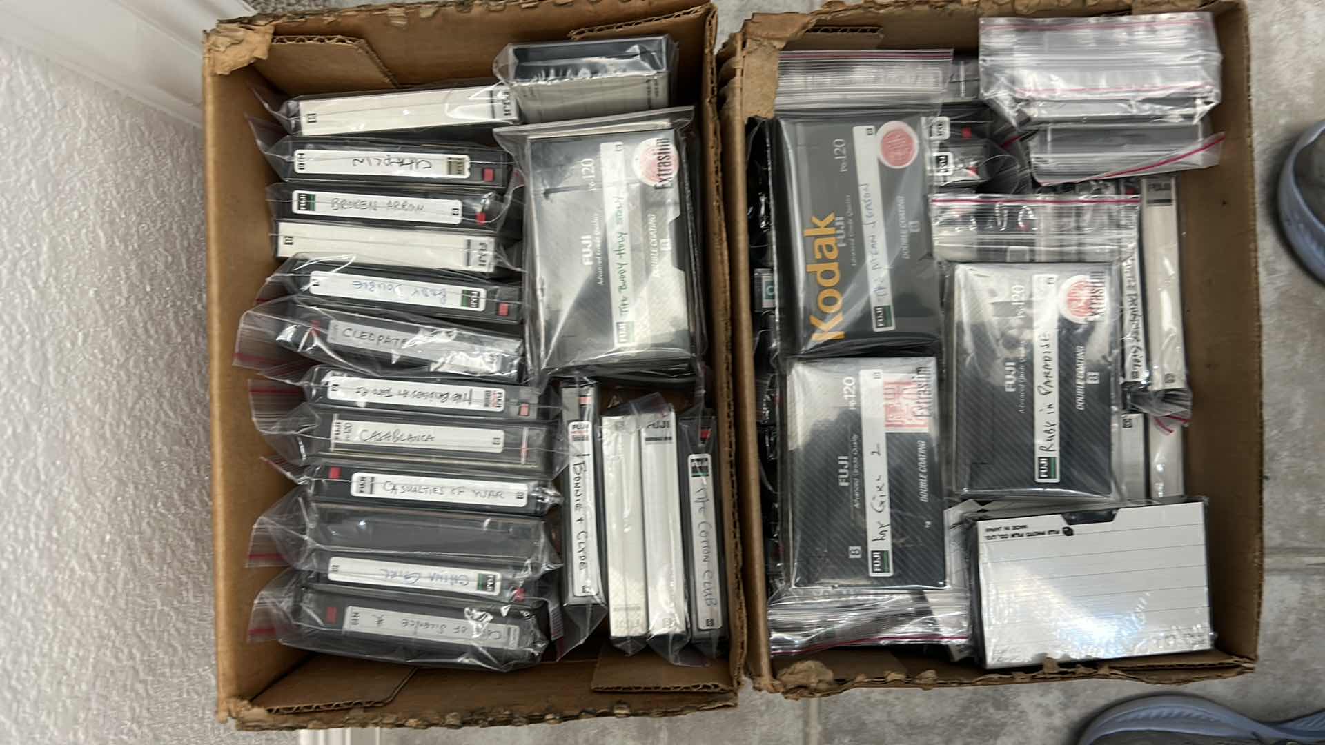 Photo 1 of 2 BOXES OF MOVIES ON CASSETTE