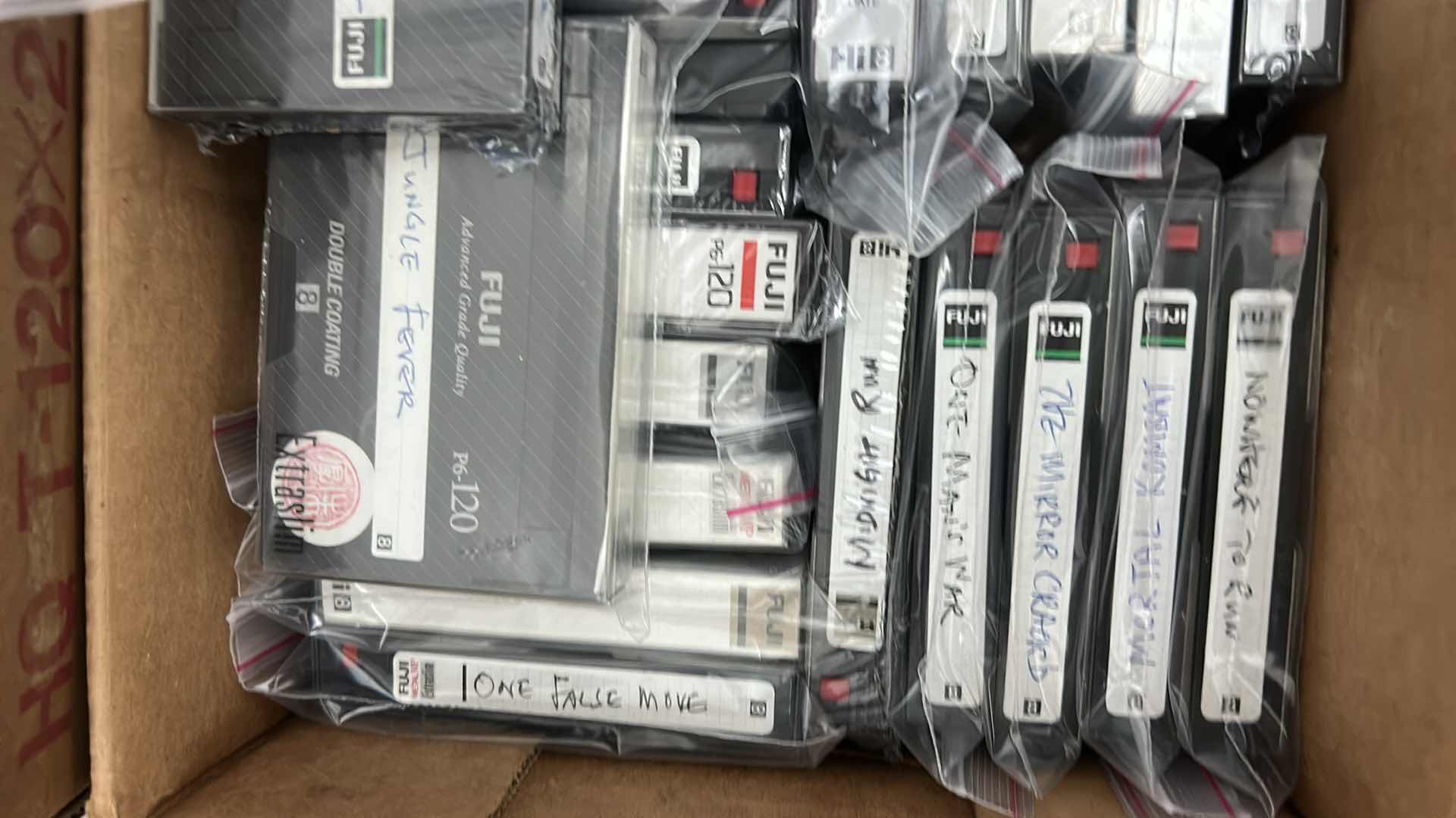 Photo 3 of 2 BOXES OF MOVIES ON CASSETTE