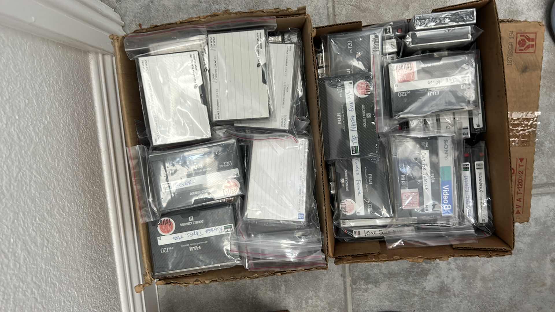Photo 1 of 2 BOXES OF MOVIES ON CASSETTE