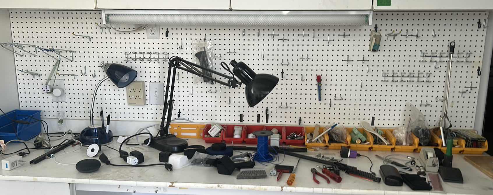 Photo 1 of CONTENTS ON PEGBOARD AND TOP OF TABLE (TWO ITEMS ARE BOLTED IN AND NOT SURE IF THEY CAN BE REMOVED, see photos for which 2