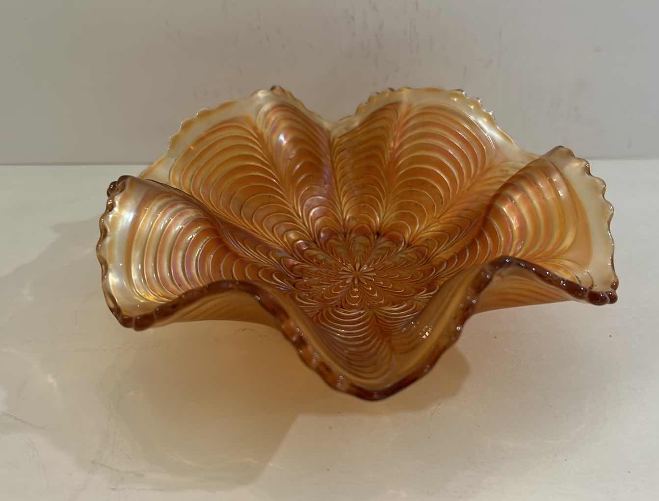 Photo 1 of VINTAGE CARNIVAL GLASS SCALLOPED BOWL 
7” x 2 1/4”