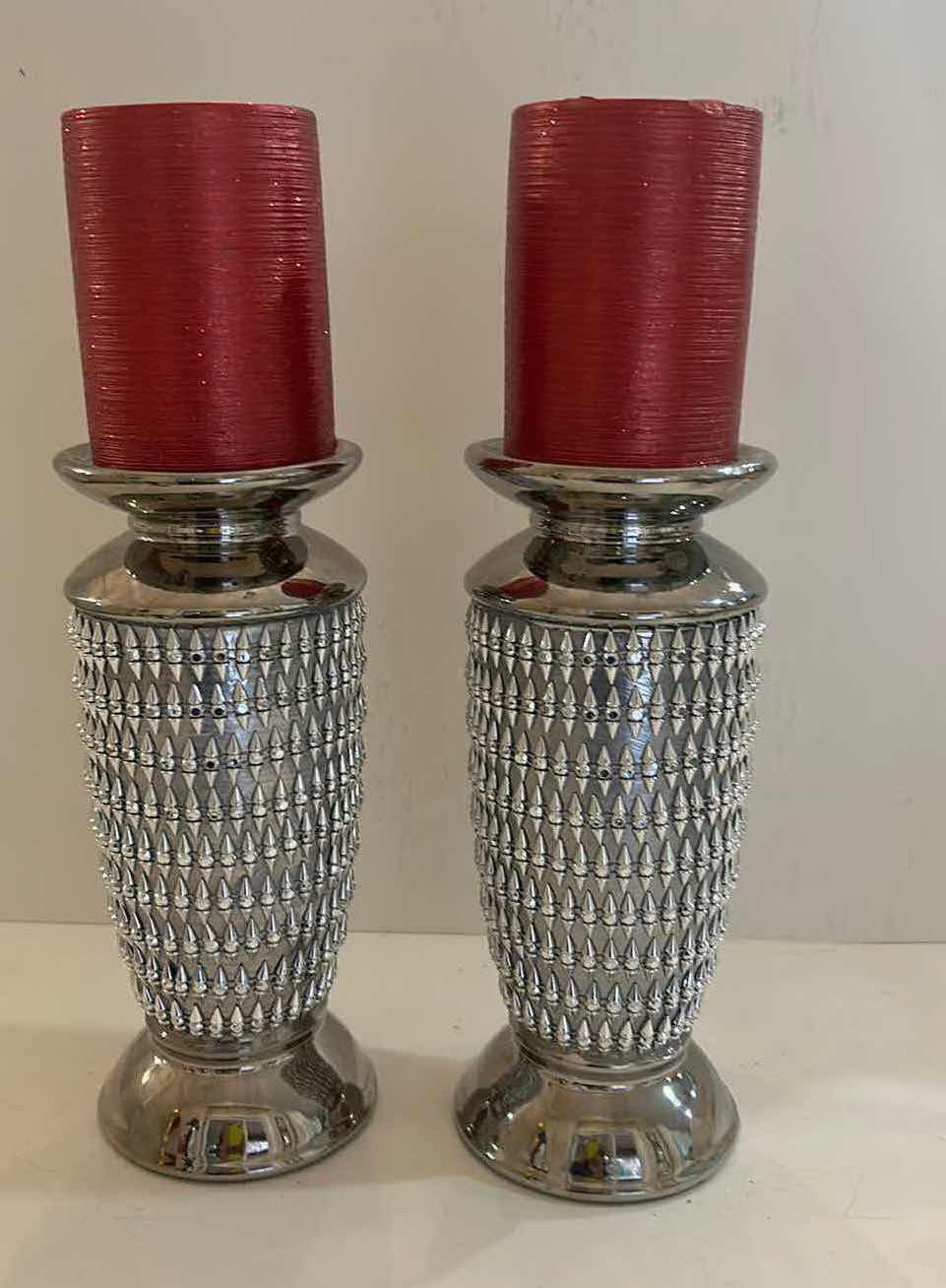 Photo 1 of 2 - 9.5” SPARKLY SILVER CANDLE HOLDERS AND 2 RED GLITTER CANDLES FROM Z GALLERI