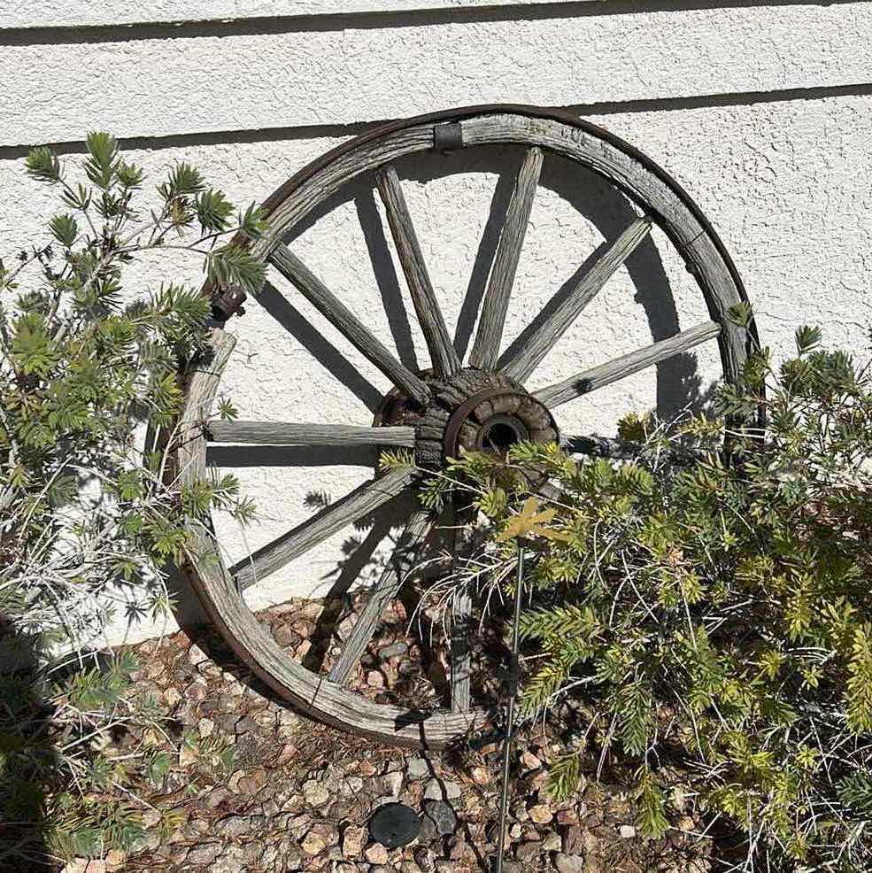 Photo 1 of ANTIQUE WOOD SND FORGED BRONZE WAGON WHEEL 42”