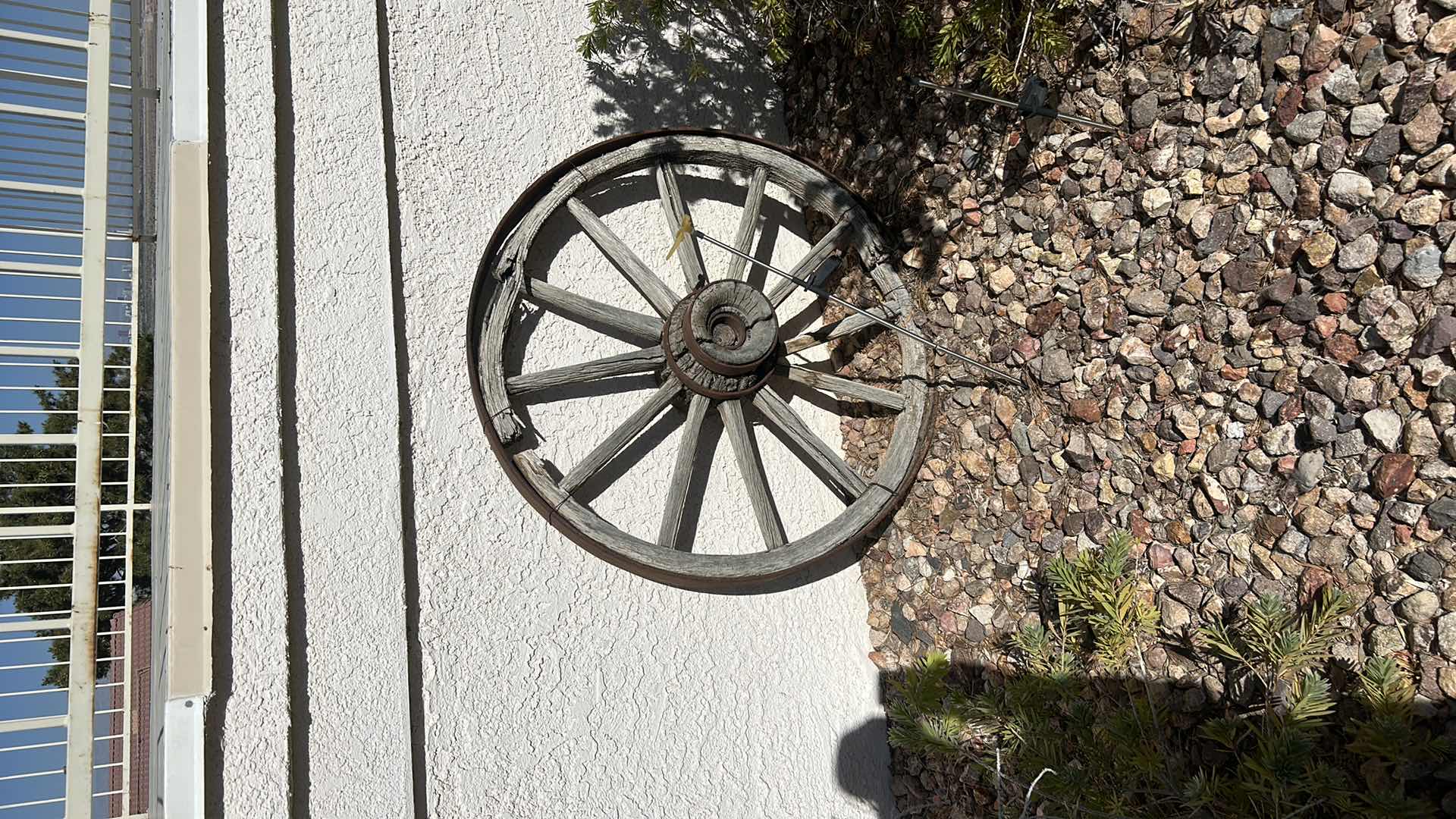 Photo 1 of ANTIQUE WOOD AND FORGED BRONZE WAGON WHEEL 3’