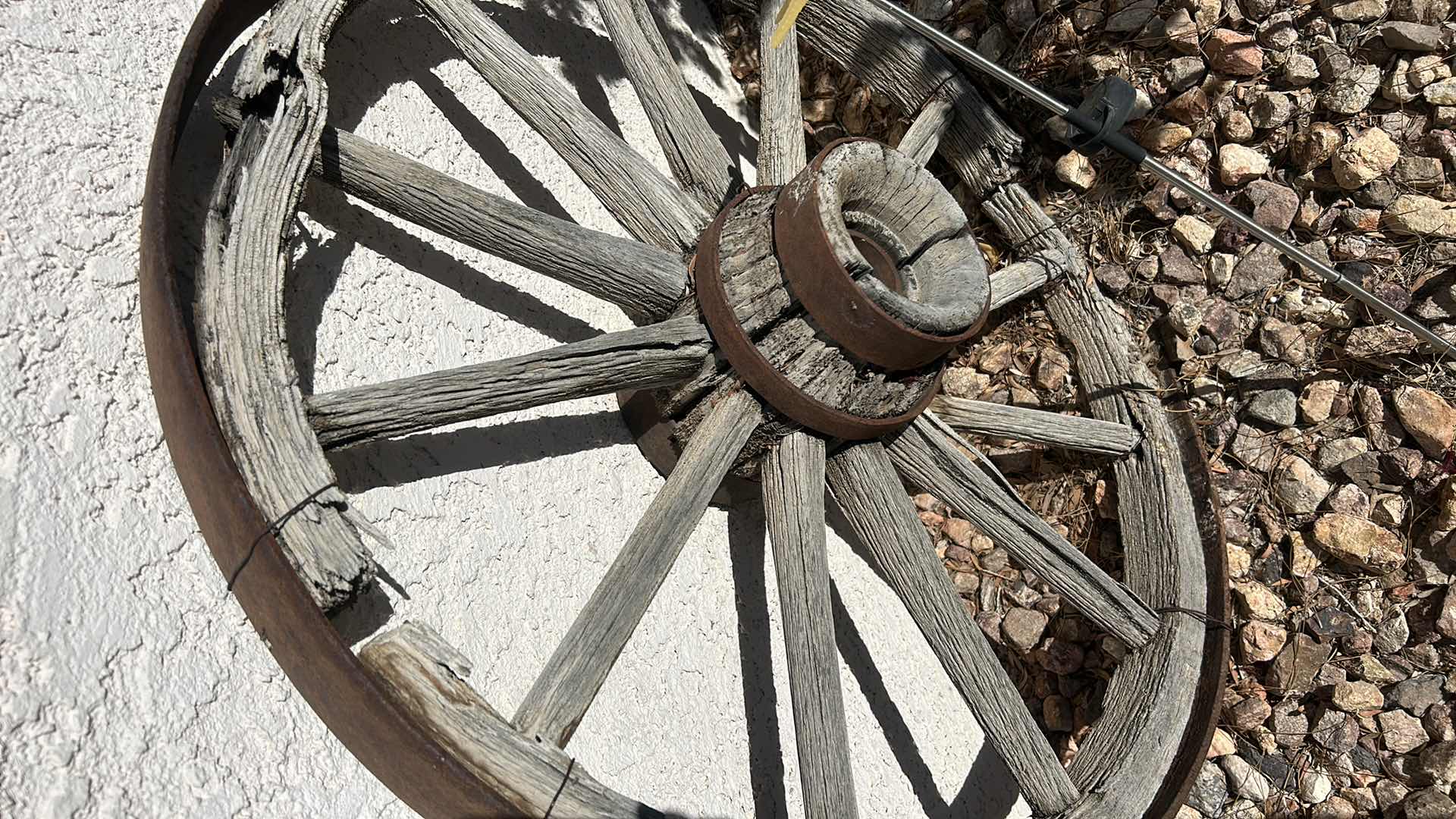 Photo 2 of ANTIQUE WOOD AND FORGED BRONZE WAGON WHEEL 3’