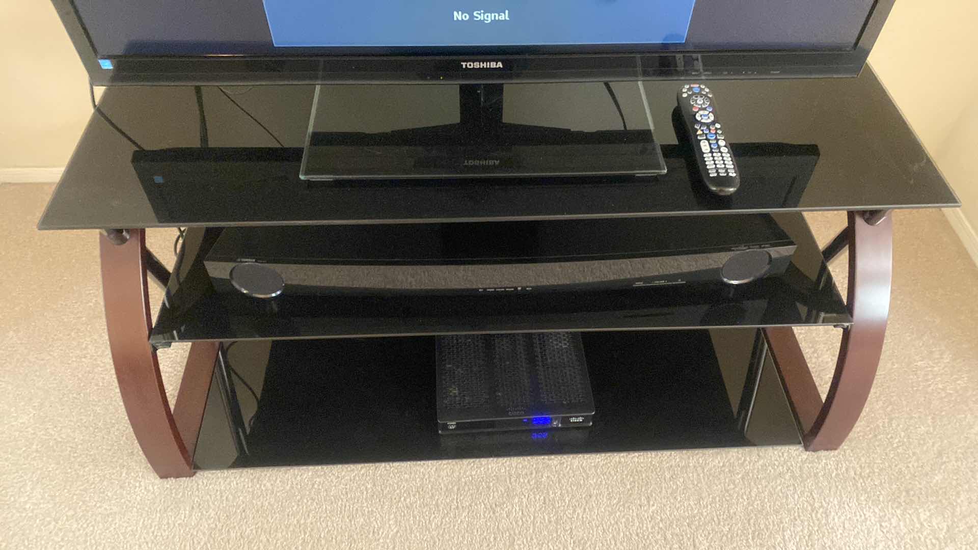 Photo 6 of TOSHIBA 46” TV WITH STAND AND YAMAHA SOUND BAR. INCLUDES COX REMOTE & TOSHIBA REMOTE STAND MEASURES 48” x 18” x 21 1/2”