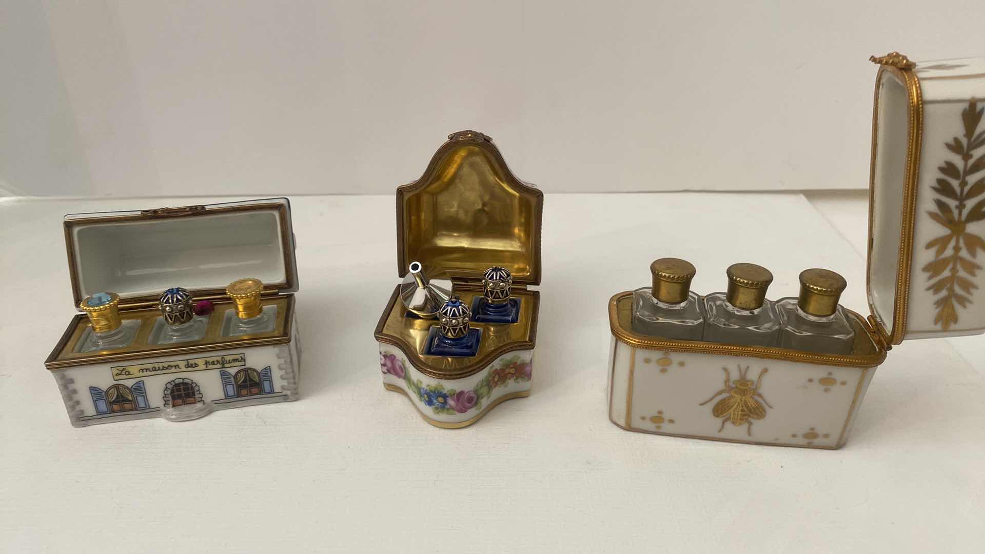 Photo 1 of LIMOGES WITH PERFUME BOTTLES LARGEST 3“ x 2 3/4”