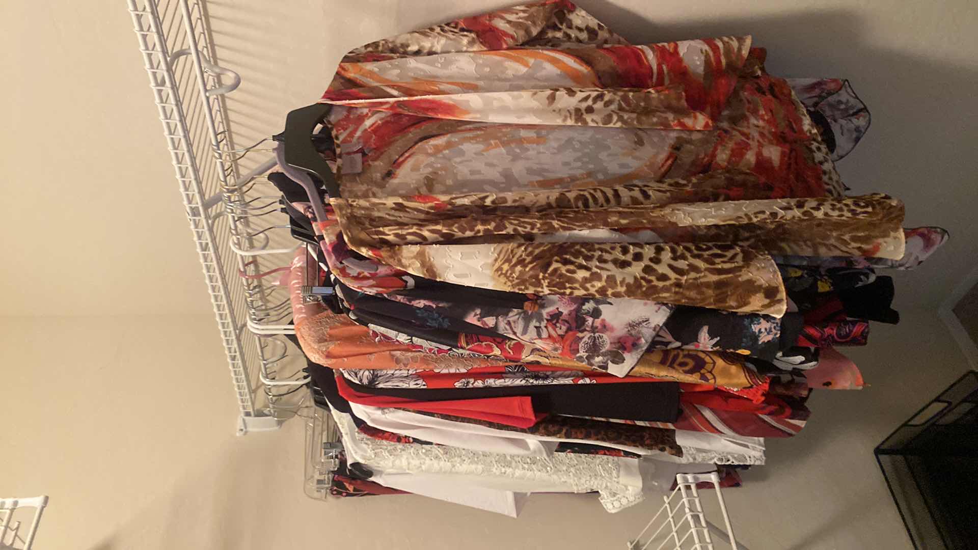 Photo 5 of WOMENS SIZE LARGE AND X-LARGE TOPS & JACKETS & SKIRTS