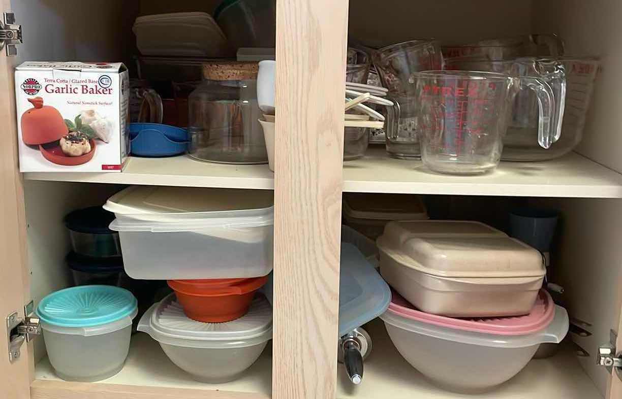 Photo 1 of CONTENTS OF CABINET- MEASURING CUPS, STORAGE CONTAINERS