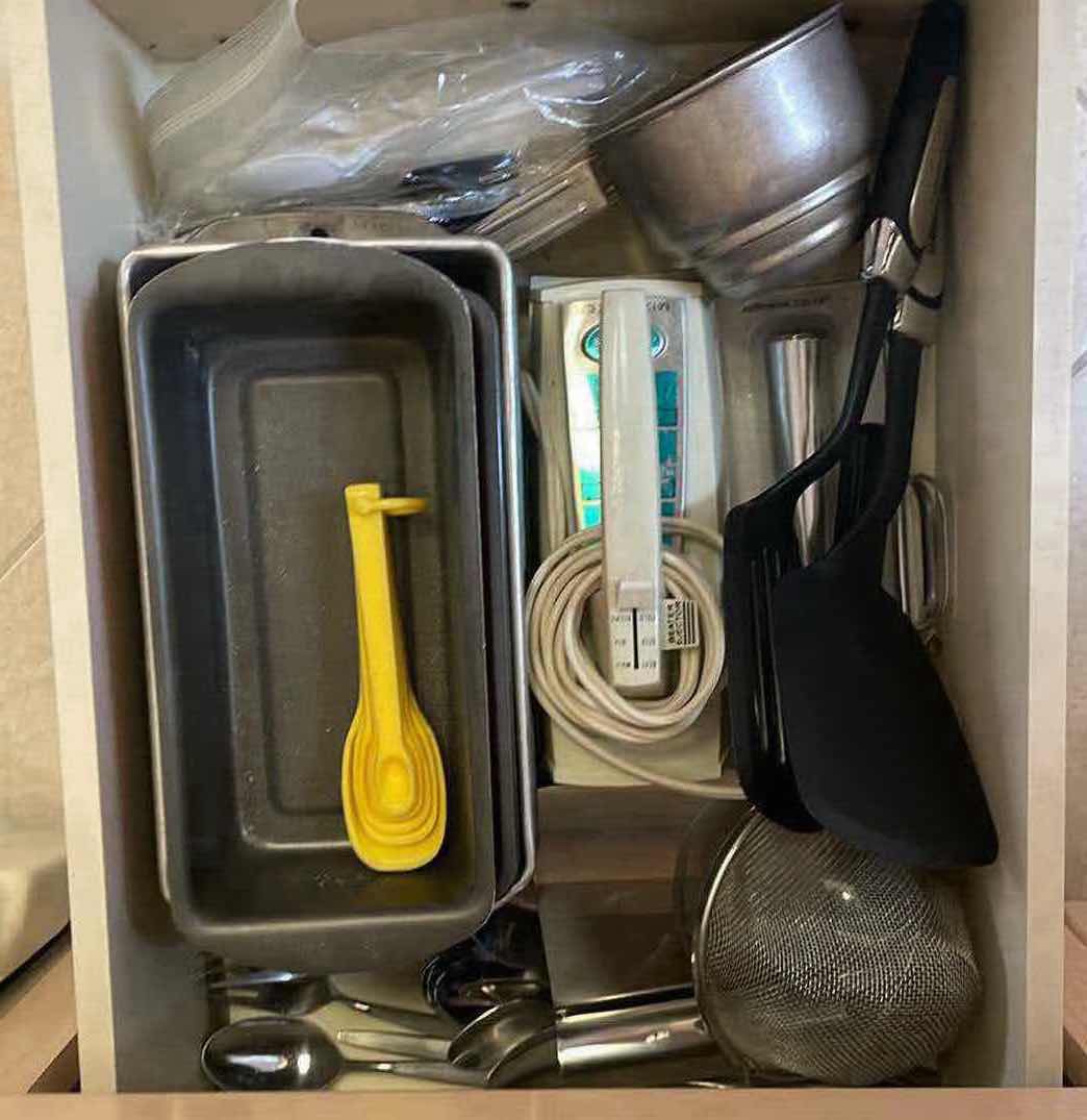 Photo 1 of CONTENTS OF KITCHEN DRAWER-BAKEWARE, HAND MIXER, UTENSILS