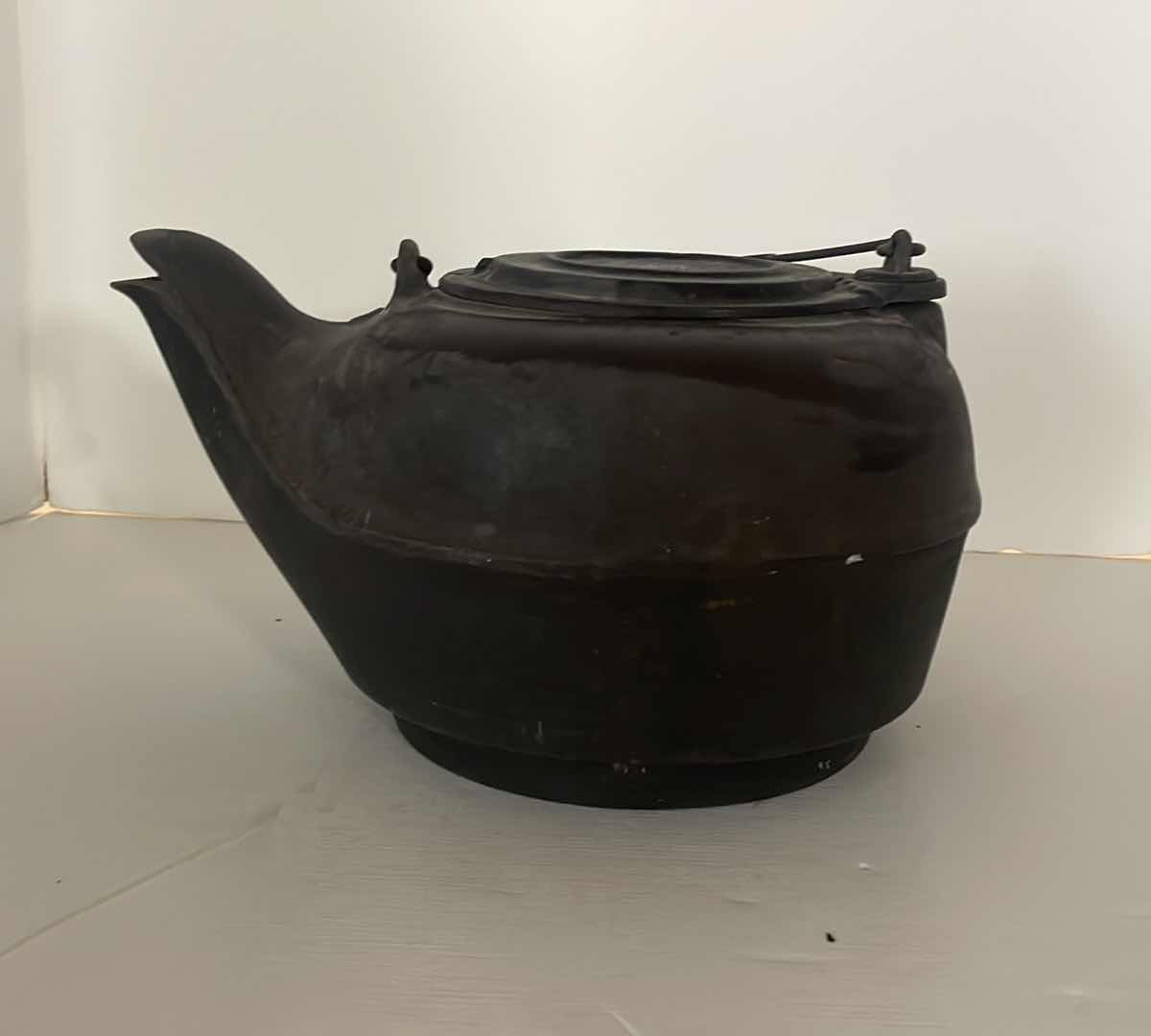 Photo 1 of ANTIQUE CAST IRON TEA KETTLE 10”