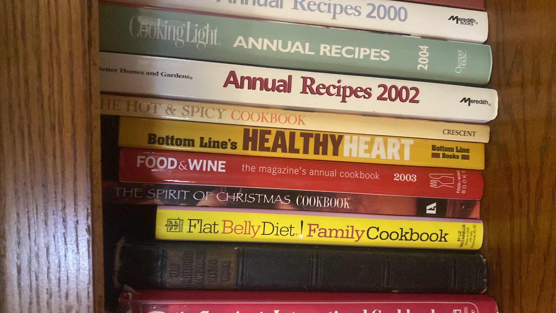 Photo 1 of SHELF OF COOK BOOKS