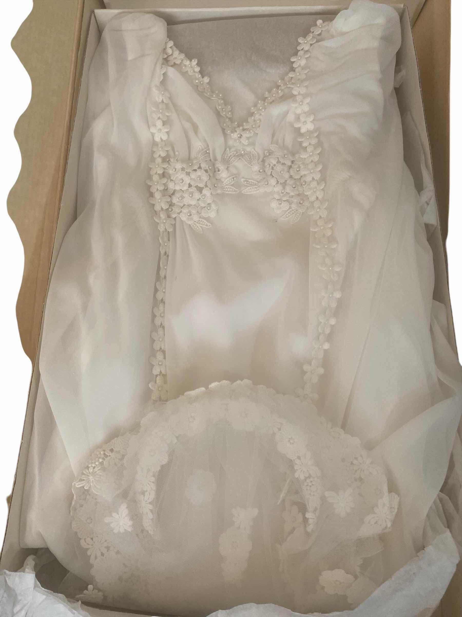 Photo 1 of VINTAGE WEDDING GOWN IN BOX SIZE UNKNOWN