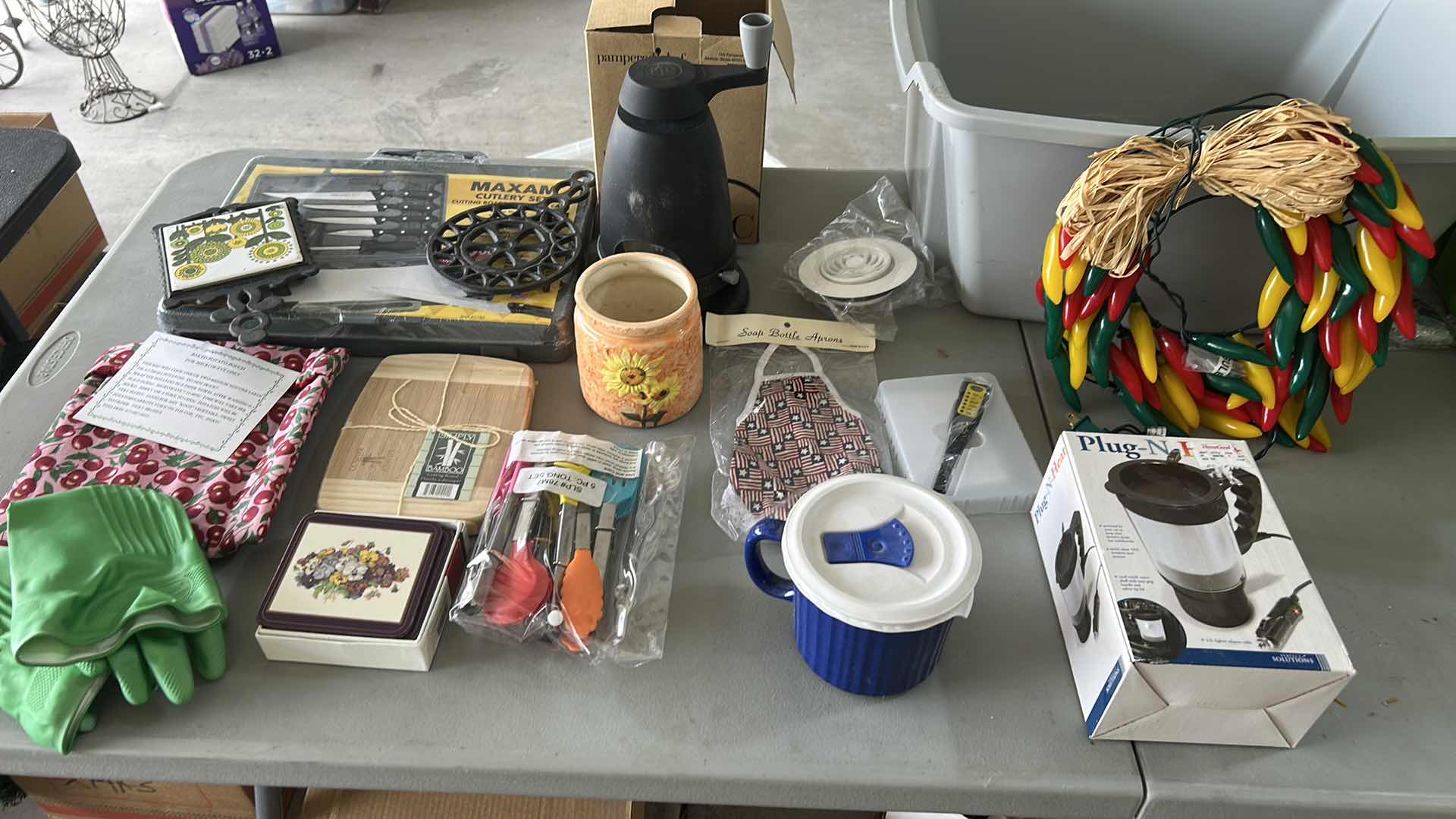 Photo 1 of TOTE FULL OF KITCHEN ITEMS