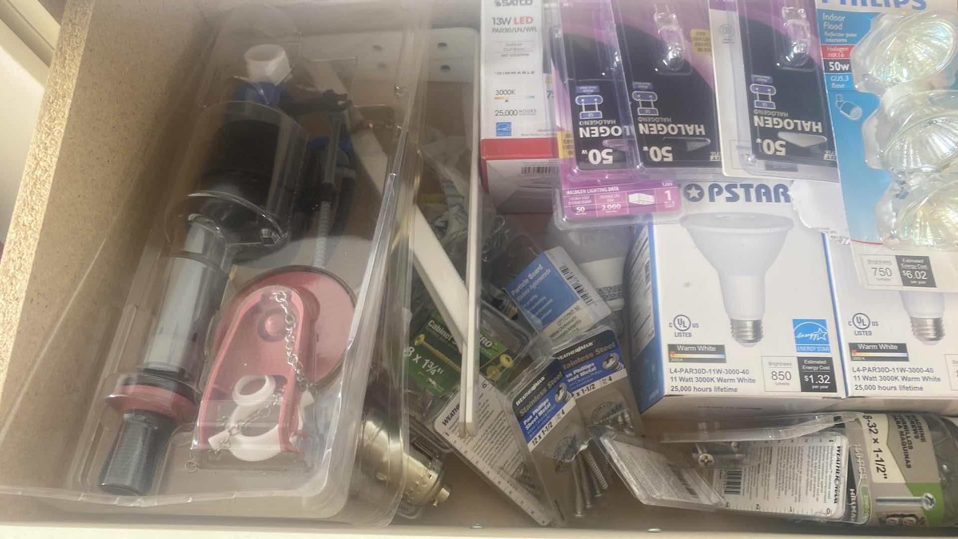Photo 1 of CONTENTS OF 3 DRAWERS - BULBS & HOME REPAIR