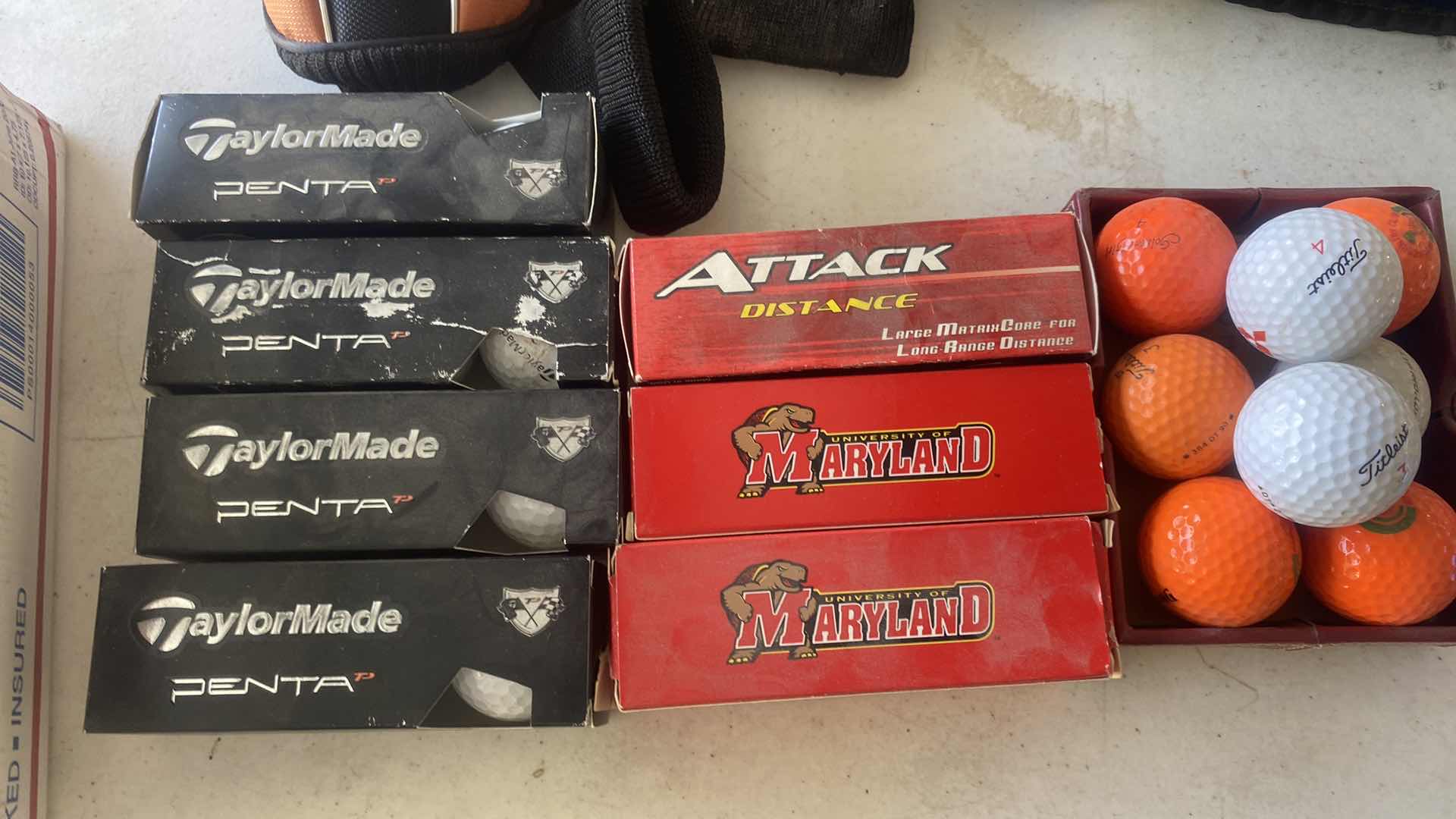Photo 1 of GOLF BALLS & CLUB COVERS