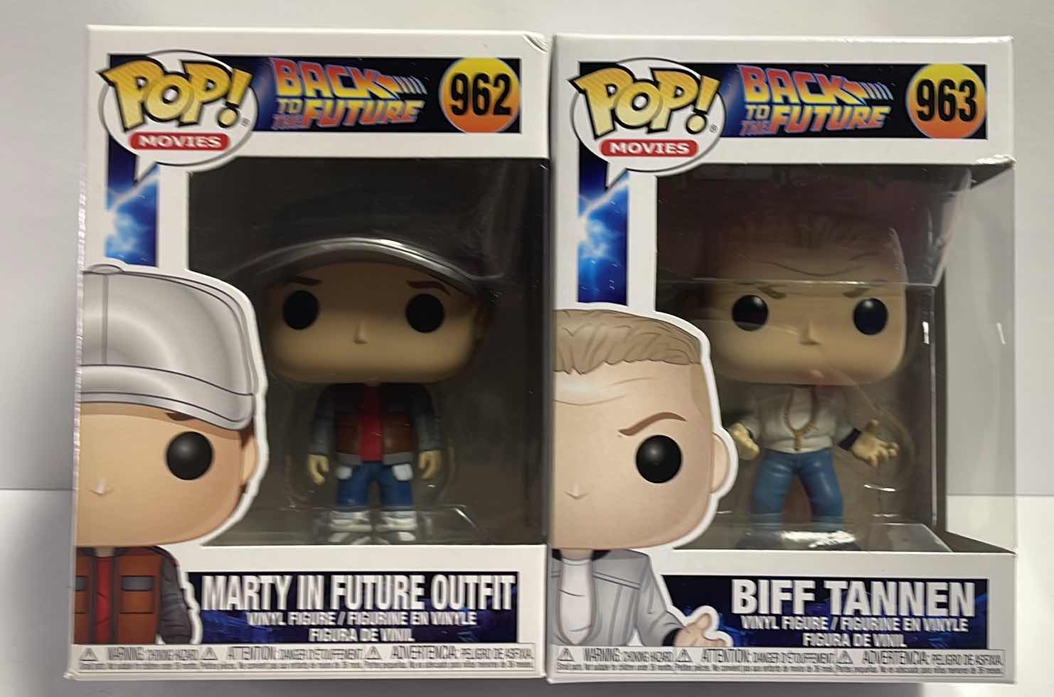 Photo 1 of NIB FUNKO POP MOVIE SERIES BACK TO THE FUTURE “MARTY IN FUTURE OUTFIT & BIFF TANNEN” - TOTAL RETAIL PRICE $26.99