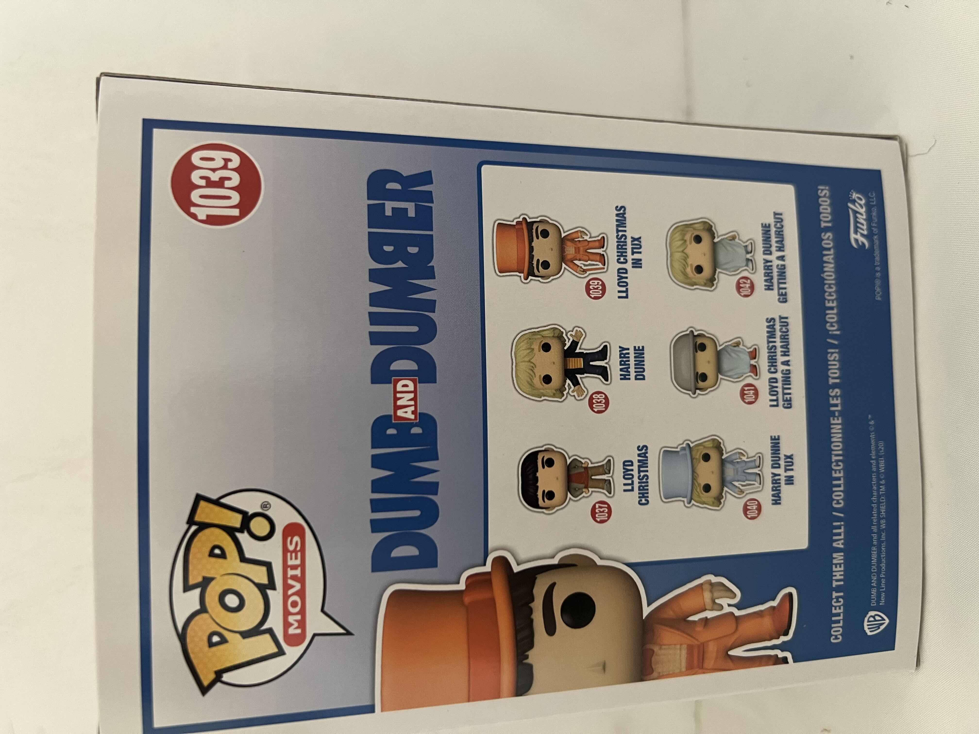 Photo 2 of NEW FUNKO POP! MOVIES DUMB AND DUMBER #1039 “LLOYD CHRISTMAS IN TUX” VINYL FIGURE