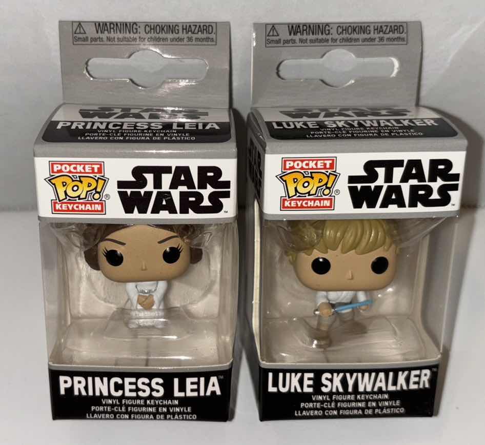 Photo 1 of NEW 2-PACK FUNKO POP! STAR WARS POCKET POP KEYCHAIN, “PRINCESS LEIA & LUKE SKYWALKER”