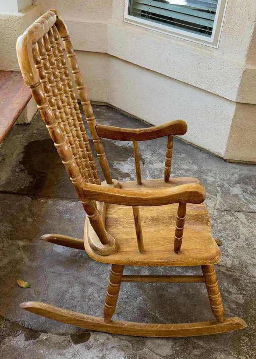 Photo 1 of ANTIQUE SOLID WOOD ROCKING CHAIR 22” X 34” H42”