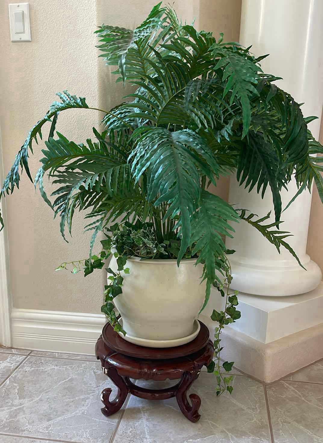Photo 1 of ARIFICIAL 3’ PLANT/FERN VINES IN CERAMIC POT WITH WOODEN STAND