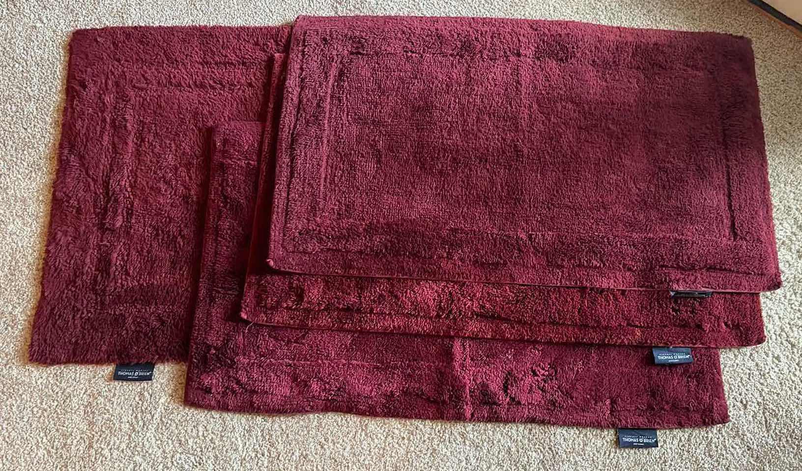 Photo 1 of THOMAS O’BRIEN BURGUNDY BATH RUGS (3) 35” X 20”, (1) 36” X 25”