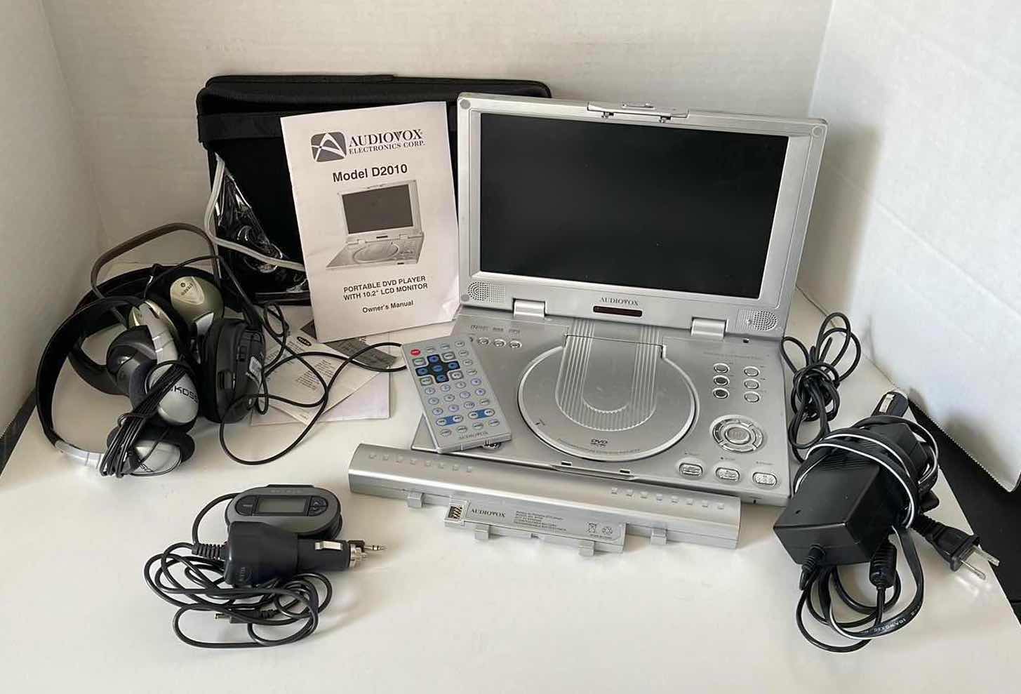Photo 1 of AUDIOVOX DVD PLAYER 10.2” LCD MONITOR & REMOTE W HEADPHONES & BELKIN FM TRANSMITTER (MODEL D2010)