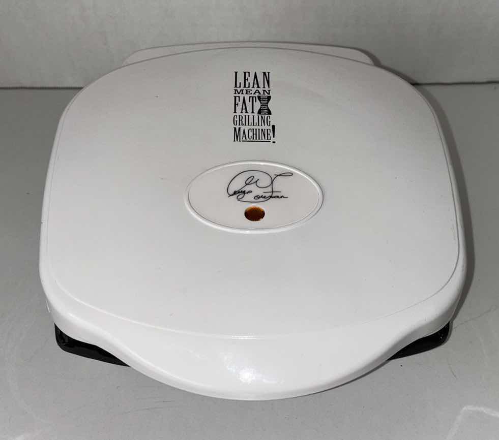 Photo 1 of GEORGE FOREMAN GRILLING MACHINE 8.75” X 9.5” H4.5”