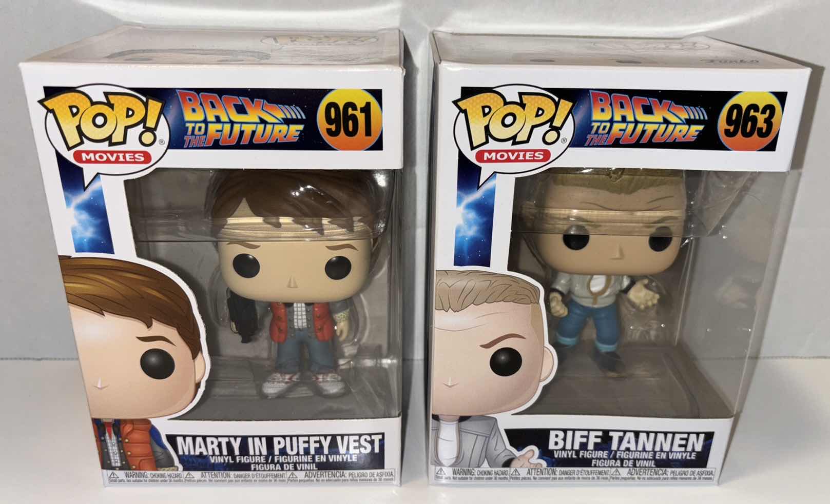 Photo 1 of NEW 2-PACK FUNKO POP! MOVIES VINYL FIGURE, BACK TO THE FUTURE #961 “MARTY IN PUFFY VEST” & #963 “BIFF TANNEN”