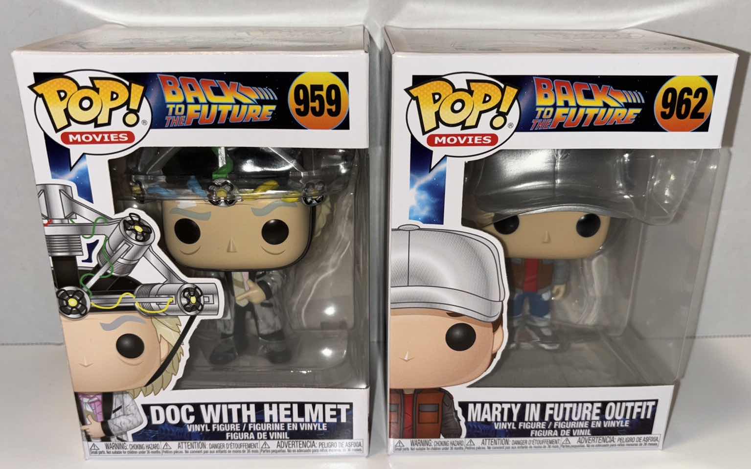 Photo 1 of NEW 2-PACK FUNKO POP! MOVIES VINYL FIGURE, BACK TO THE FUTURE #959 “DOC WITH HELMET” & #962 “MARTY IN FUTURE OUTFIT”