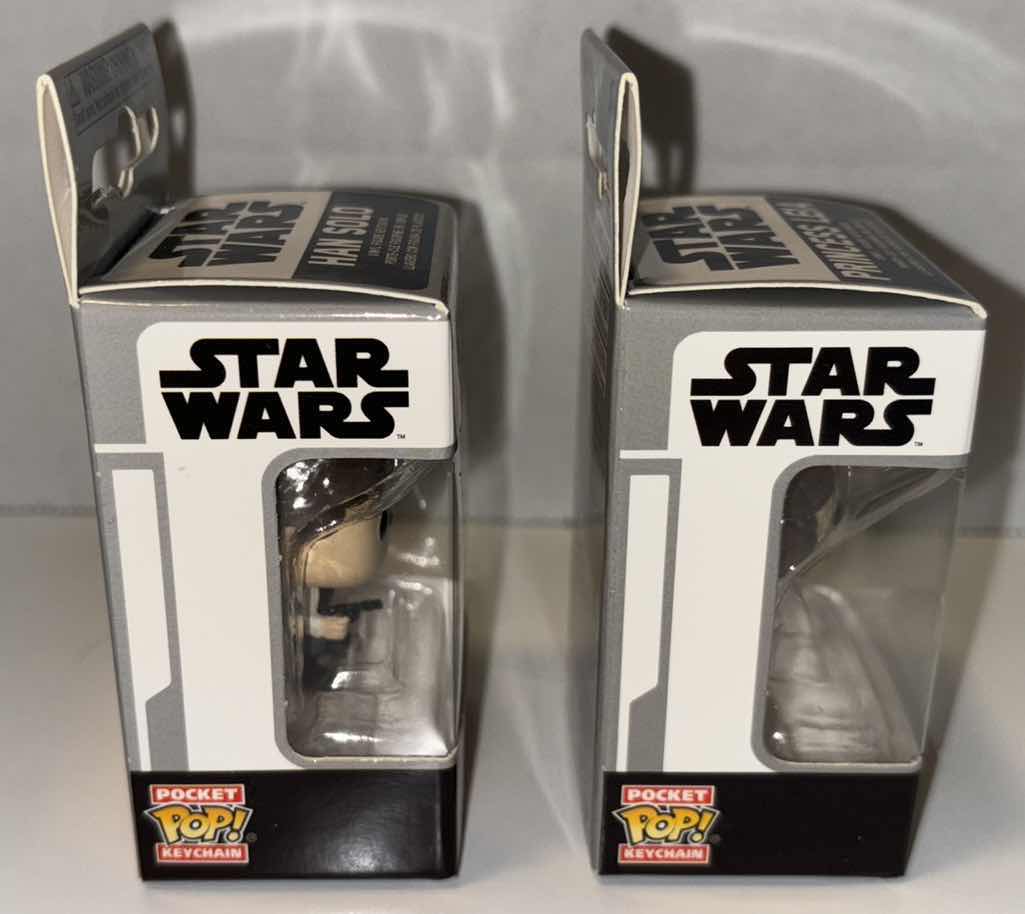 Photo 2 of NEW 2-PACK FUNKO POP!
STAR WARS POCKET POP VINYL FIGURE KEYCHAIN, “HAN SOLO” & "PRINCESS LEIA"