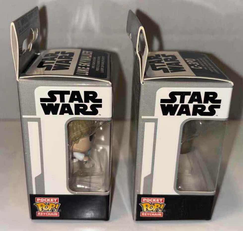 Photo 2 of NEW 2-PACK FUNKO POP!
STAR WARS POCKET POP VINYL FIGURE KEYCHAIN, "LUKE SKYWALKER" & "C-3PO"