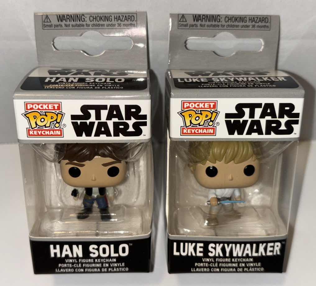 Photo 1 of NEW 2-PACK FUNKO POP!
STAR WARS POCKET POP VINYL FIGURE KEYCHAIN, “HAN SOLO” & "LUKE SKYWALKER"