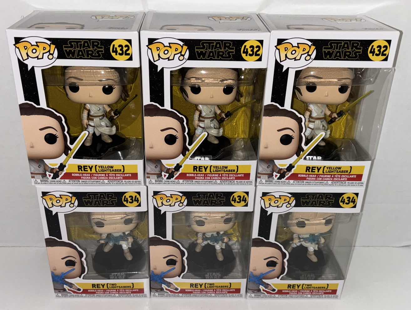 Photo 1 of NEW 6-PACK ASSORTED STAR WARS FUNKO POP! BOBBLEHEAD FIGURES, #432 REY W/YELLOW LIGHTSABER (3) & #434 REY W/TWO LIGHTSABERS(3)