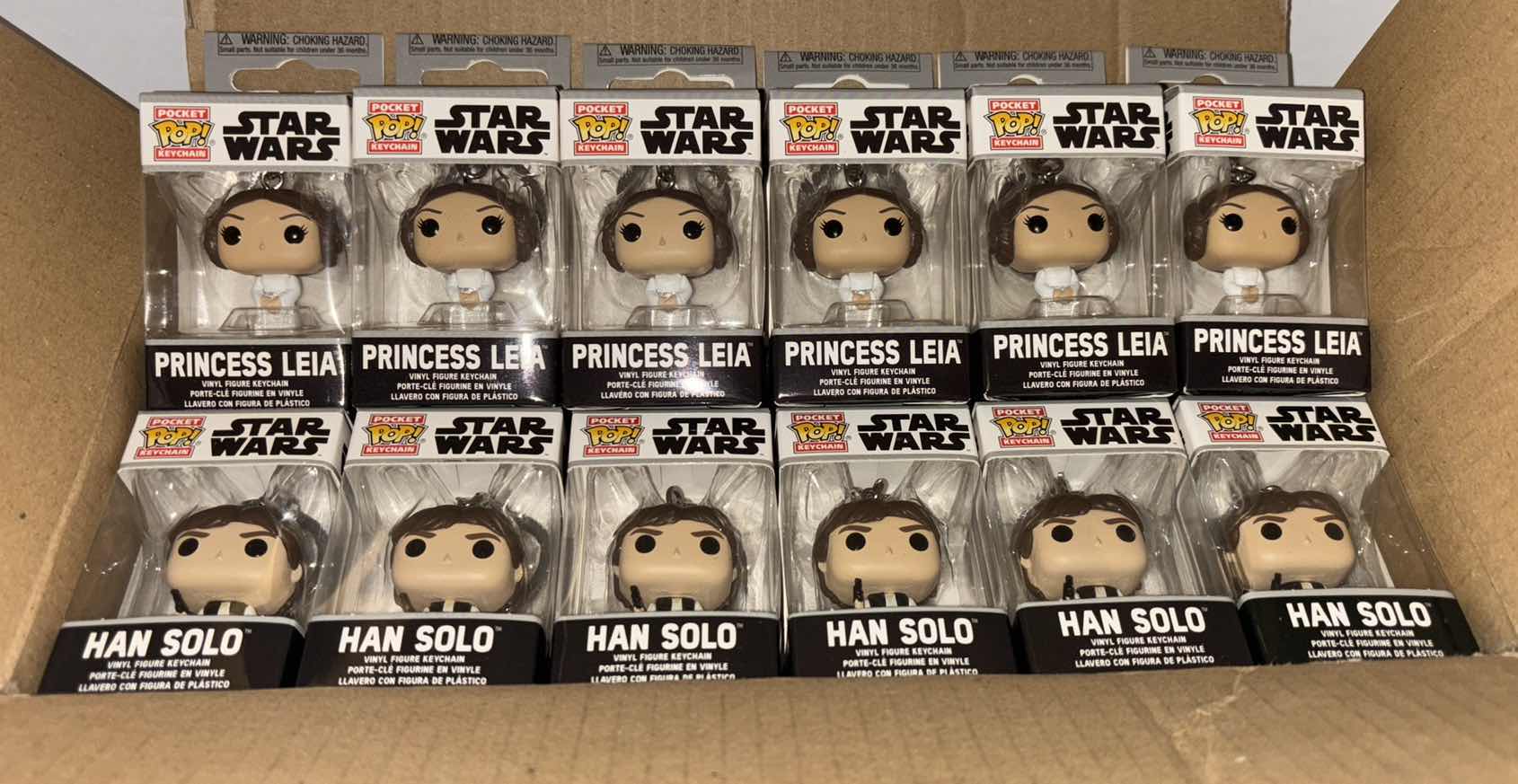 Photo 1 of NEW 12-PACK FUNKO POP!
STAR WARS POCKET POP VINYL FIGURE KEYCHAIN, "PRINCESS LEIA" (6) & "HAN SOLO" (6)