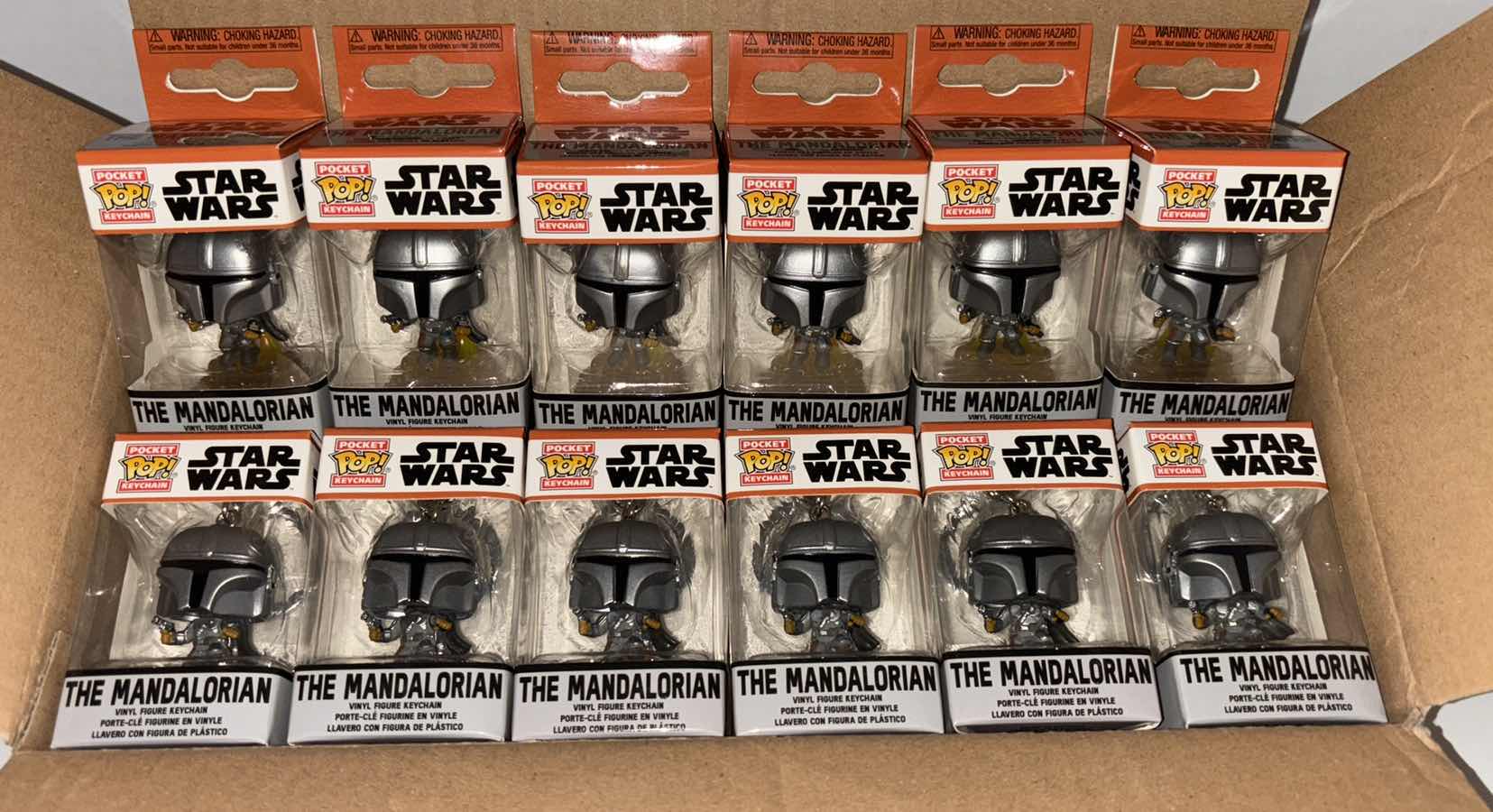 Photo 1 of NEW 12-PACK FUNKO POP!
STAR WARS MANDALORIAN POCKET POP VINYL FIGURE KEYCHAIN, "MANDO W/BLASTER”