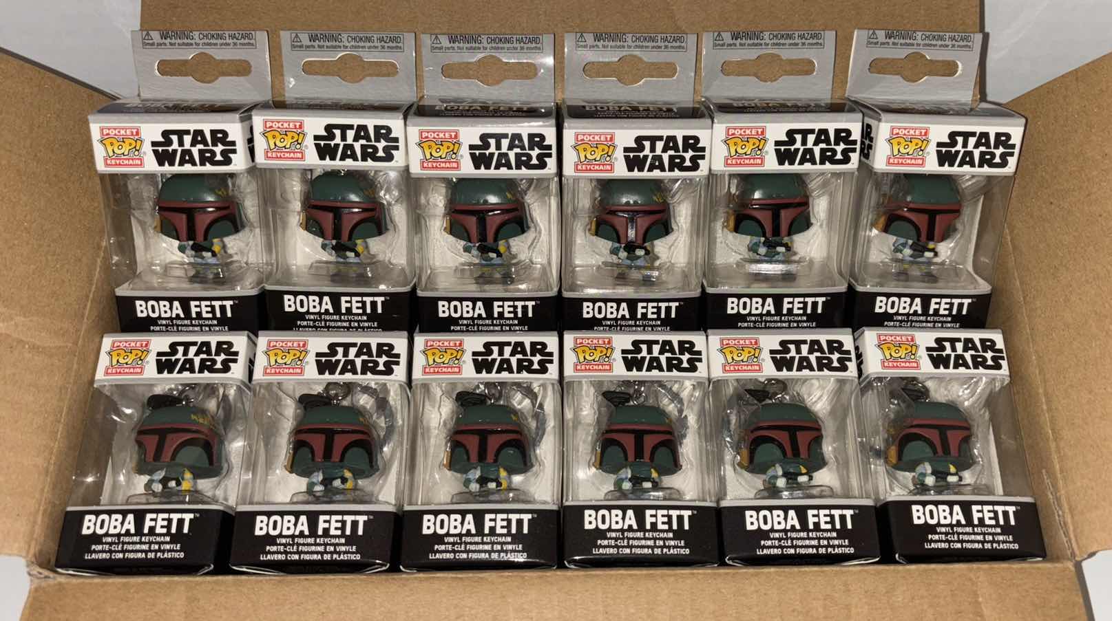 Photo 1 of NEW 12-PACK FUNKO POP!
STAR WARS POCKET POP VINYL FIGURE KEYCHAIN "BOBA FETT”