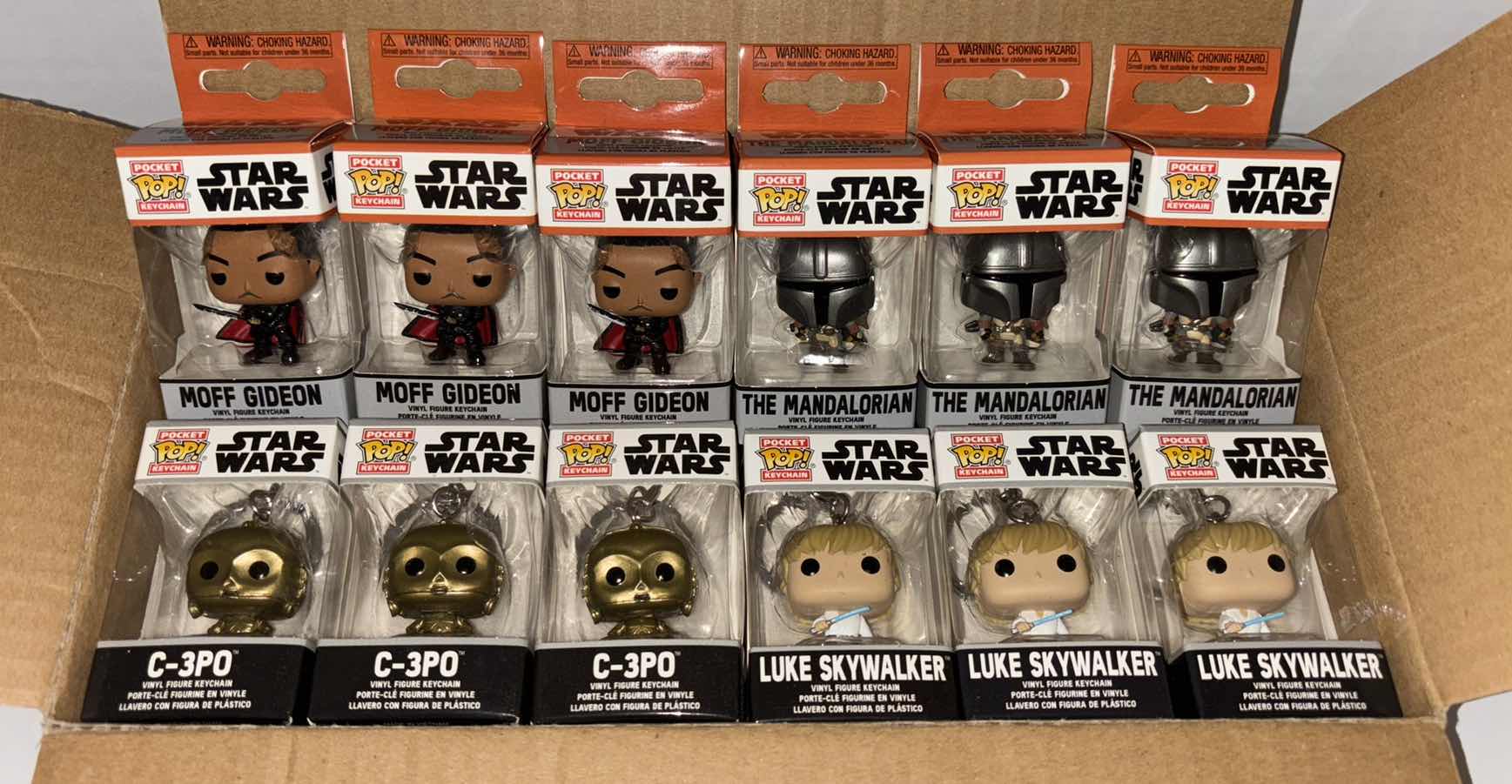 Photo 1 of NEW 12-PACK FUNKO POP!
STAR WARS POCKET POP VINYL FIGURE KEYCHAIN “MOFF GIDEON”, “THE MANDALORIAN”, “C-3PO”, “LUKE SKYWALKER” (3 EACH)