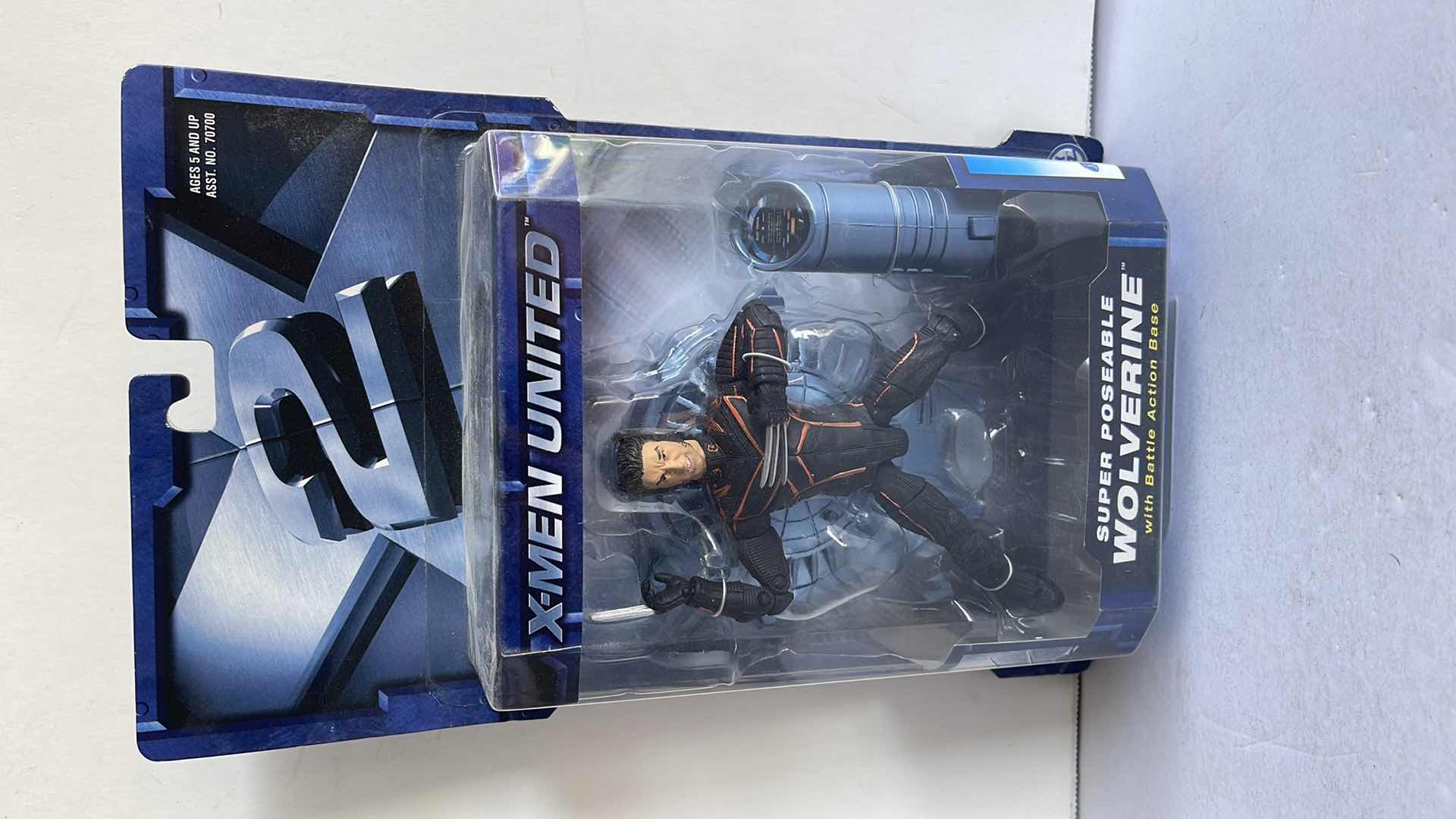 Photo 1 of NIB X-MEN UNITED SUPER POSEABLE WOLVERINE WITH BATTLE ACTION BASE MSRP $19.99